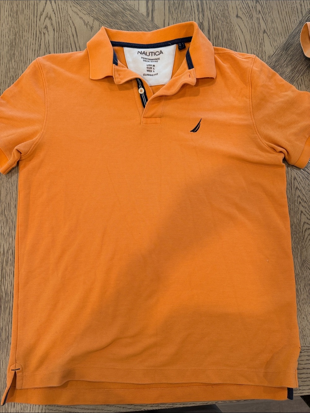 Nautica Men’s Orange Polo with Navy Sail Logo
